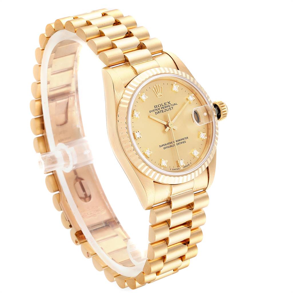 The Rolex Mid-Size 68278 Women's Yellow Gold Champagne Dial 68278 Women's Yellow Gold Champagne Dial watch is shown at a slight angle, highlighting the gold bracelet, crown, and face with diamond hour markers.