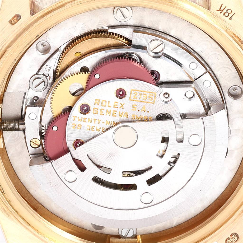 This is an internal view of a Rolex Mid-Size 68278 Women's Yellow Gold Champagne Dial 68278 Women's Yellow Gold Champagne Dial model watch, showing the movement and mechanisms.