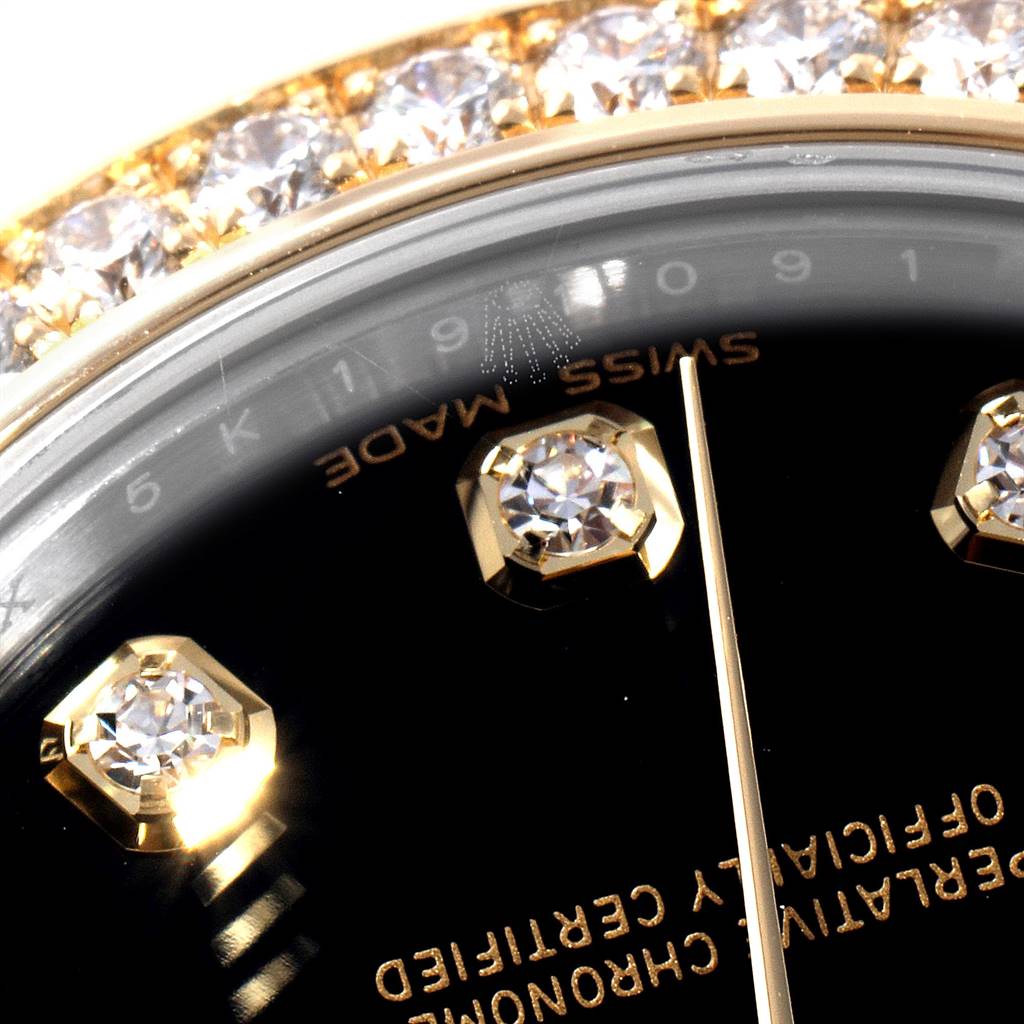 The image shows a close-up of the dial, bezel with diamonds, and indices of a Mid-Size Rolex watch.
