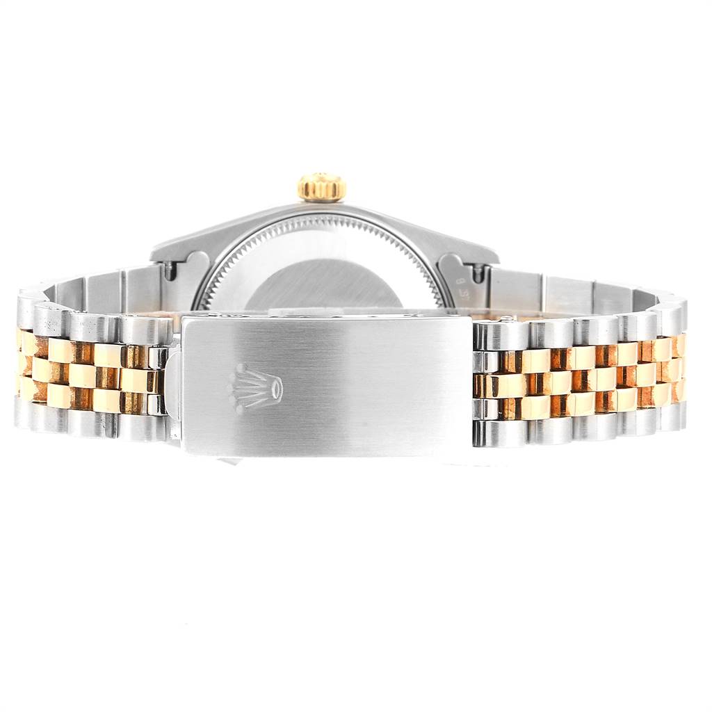 This image shows the clasp and bracelet of a Rolex Mid-Size 68273 Women's Steel and Gold (two tone) Champagne Dial 68273 Women's Steel and Gold (two tone) Champagne Dial model watch from the back.