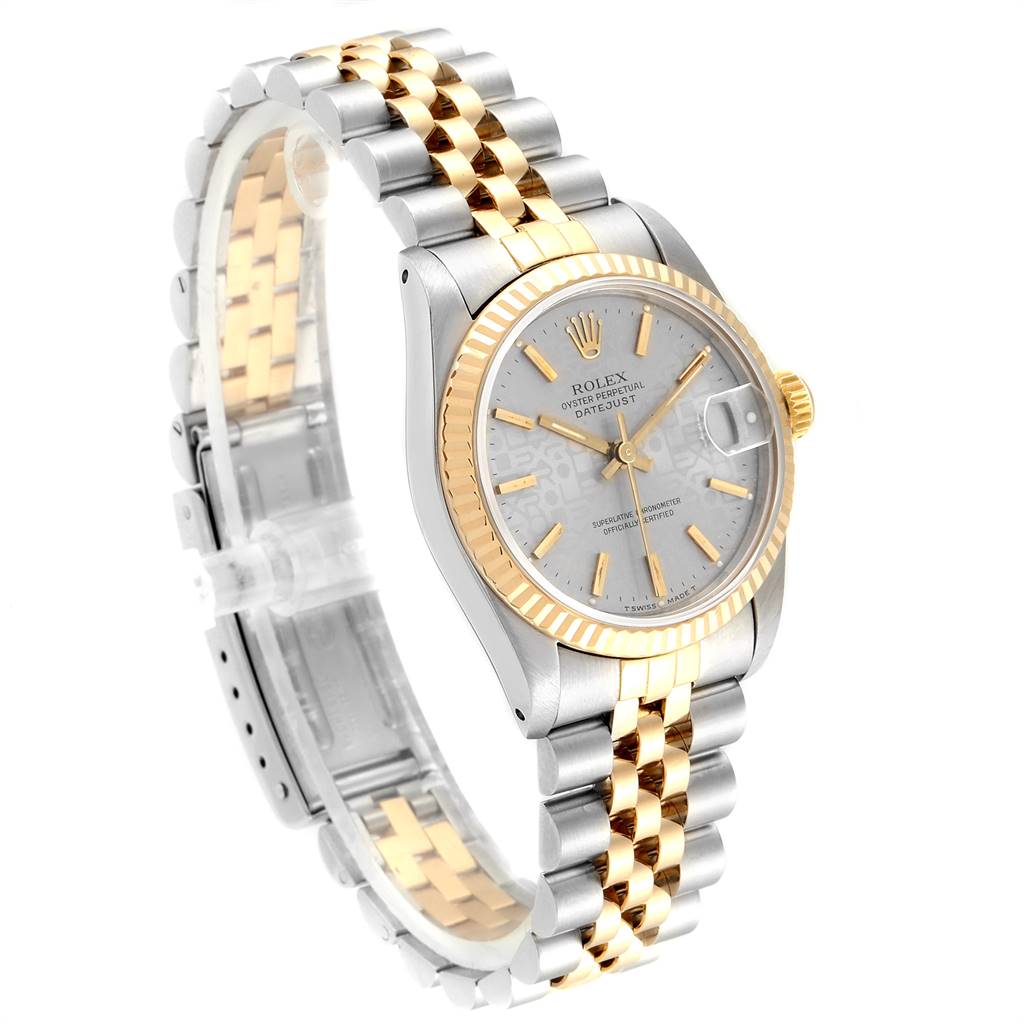 The image shows a side-angle view of a Rolex Mid-Size 68273 Women's Steel and Gold (two tone) Silver Dial 68273 Women's Steel and Gold (two tone) Silver Dial watch, highlighting the two-tone bracelet, fluted bezel, and dial.