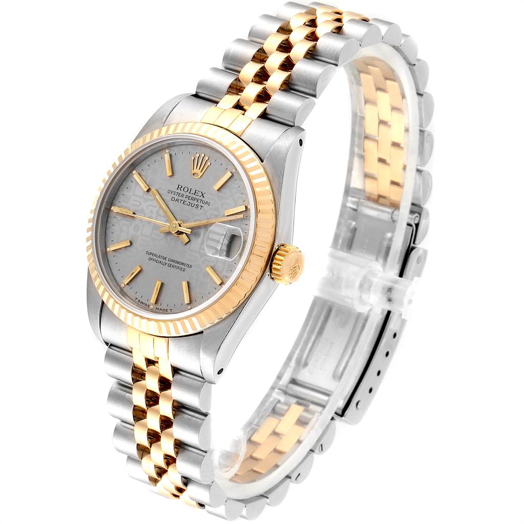 This image shows a Rolex Mid-Size 68273 Women's Steel and Gold (two tone) Silver Dial 68273 Women's Steel and Gold (two tone) Silver Dial Oyster Perpetual Datejust watch at an angle highlighting the face, bezel, crown, and two-tone bracelet.