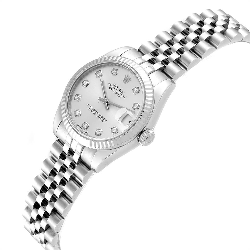 This image shows a Rolex Mid-Size 178274 Women's Stainless Steel Silver Dial 178274 Women's Stainless Steel Silver Dial Datejust watch at a tilted angle, highlighting its face, bezel, crown, and bracelet.