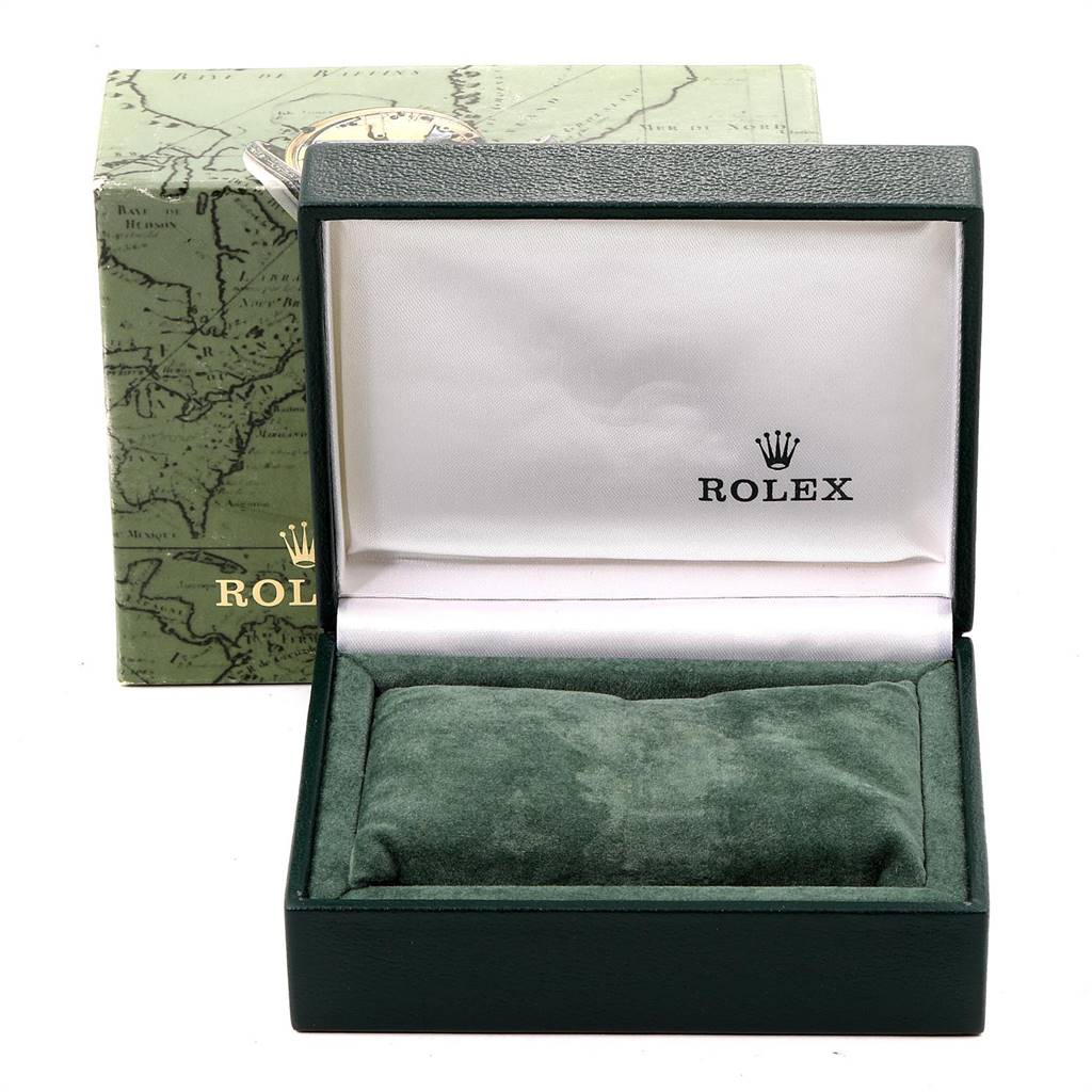 The image shows the open box and outer packaging of a Mid-Size Rolex watch.