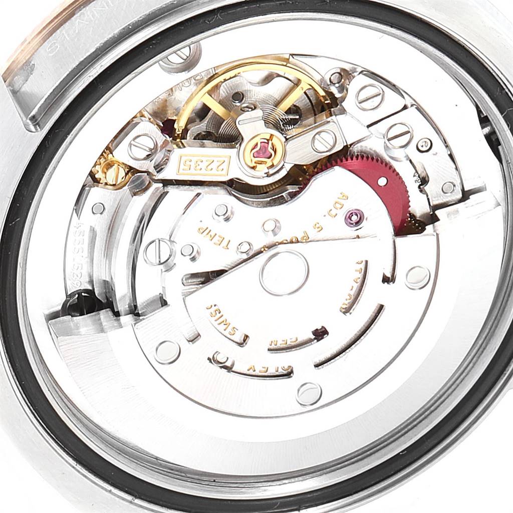 This image shows the internal mechanism and movement of a Rolex Mid-Size 178271 Women's Steel and Gold (two tone) Pink Dial 178271 Women's Steel and Gold (two tone) Pink Dial model watch, viewed from the back.