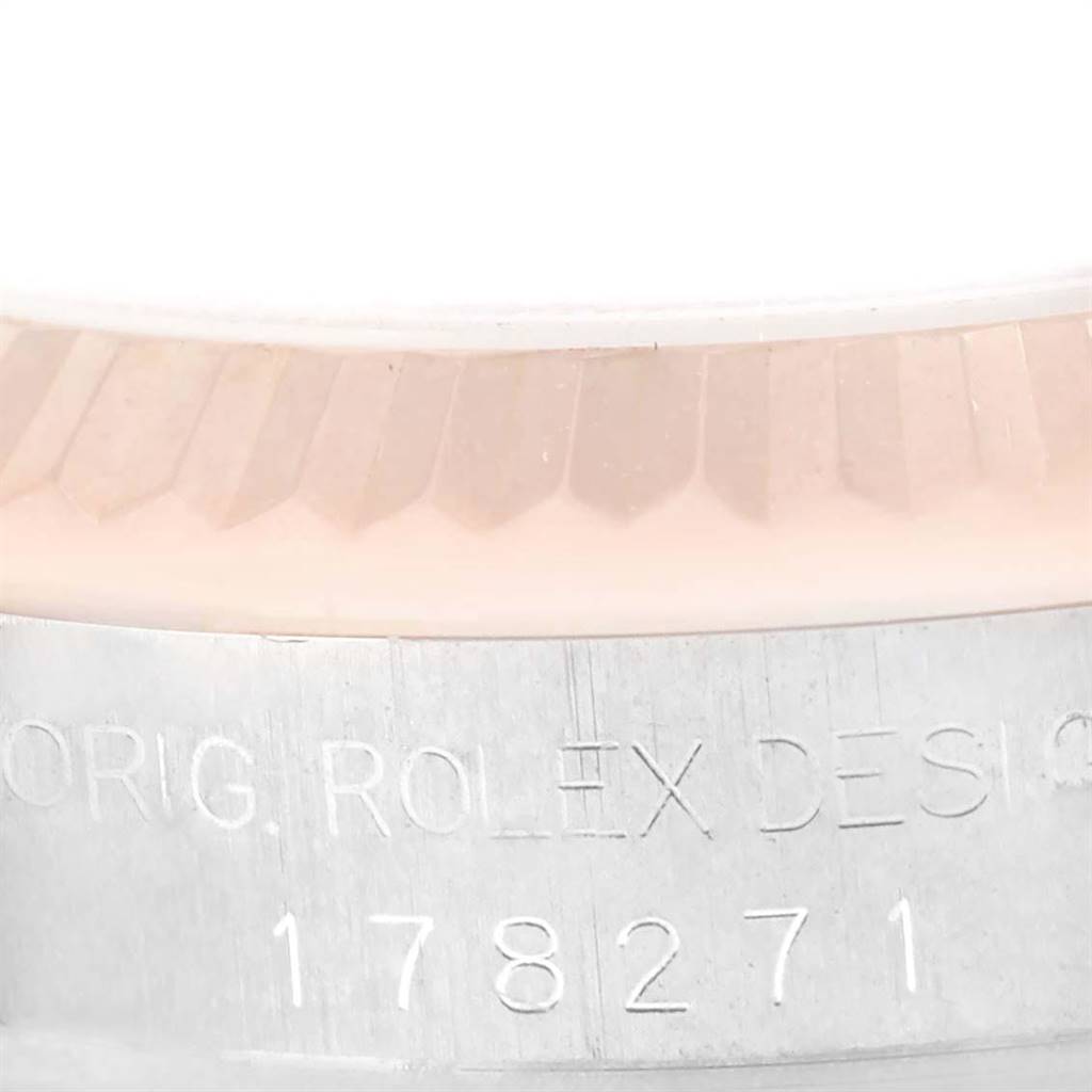 The image shows a close-up of the model and serial number engraving on the bezel of a Rolex Mid-Size 178271 Women's Steel and Gold (two tone) Pink Dial 178271 Women's Steel and Gold (two tone) Pink Dial watch.