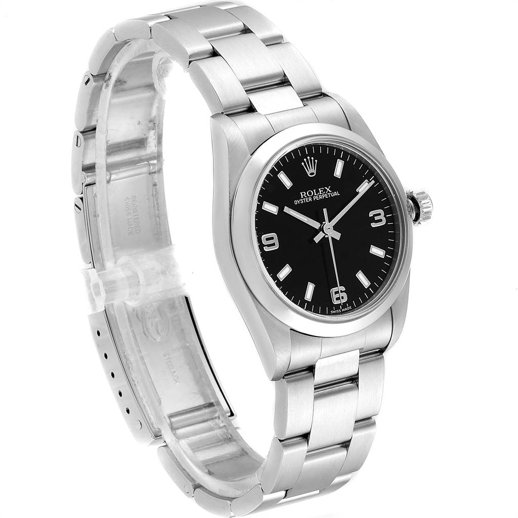 This Rolex Mid-Size 77080 Women
s Stainless Steel Black Dial 77080 Women
s Stainless Steel Black Dial Oyster Perpetual watch is shown at a slight angle, displaying the face, bezel, and bracelet.