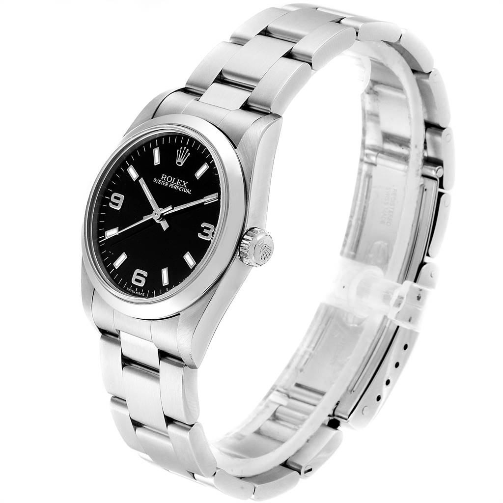 The image shows a side view of a Rolex Mid-Size 77080 Women
s Stainless Steel Black Dial 77080 Women
s Stainless Steel Black Dial Oyster Perpetual watch, highlighting its strap, dial, and crown.