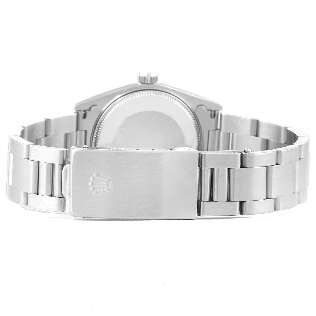 The image shows the back view of a Rolex Mid-Size 77080 Women's Stainless Steel Black Dial 77080 Women's Stainless Steel Black Dial watch, highlighting its clasp and stainless steel bracelet.