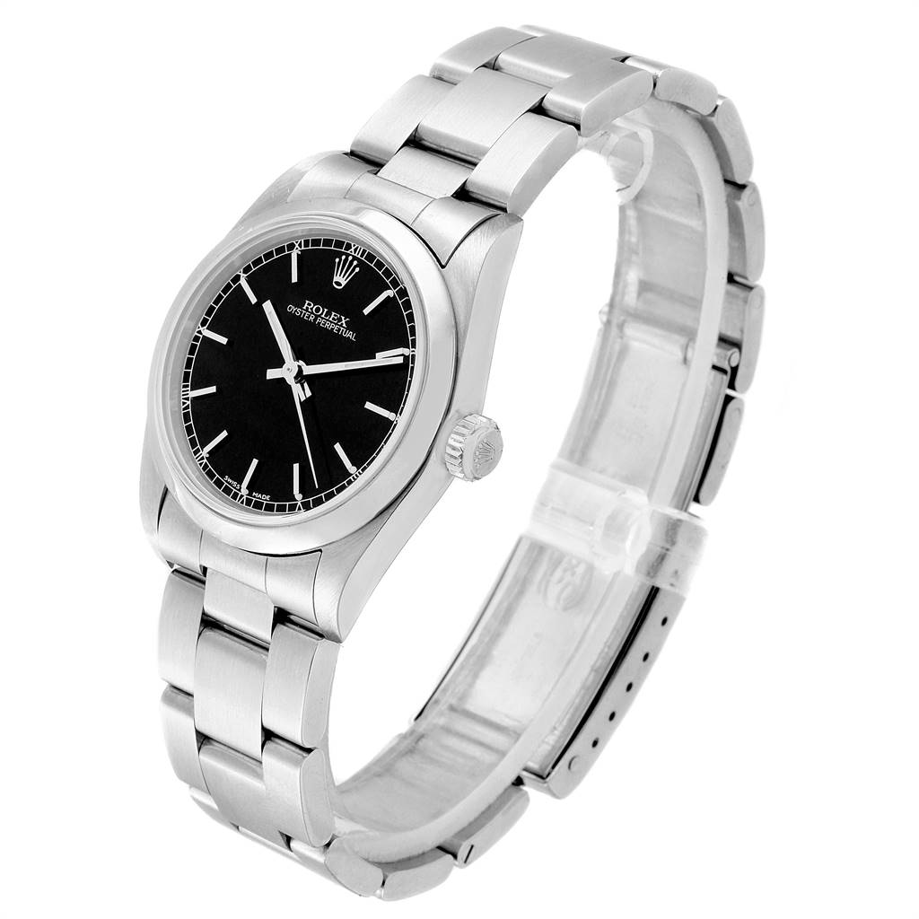 The Mid-Size Rolex watch is shown at a three-quarter angle, highlighting the face, bezel, case, and bracelet.