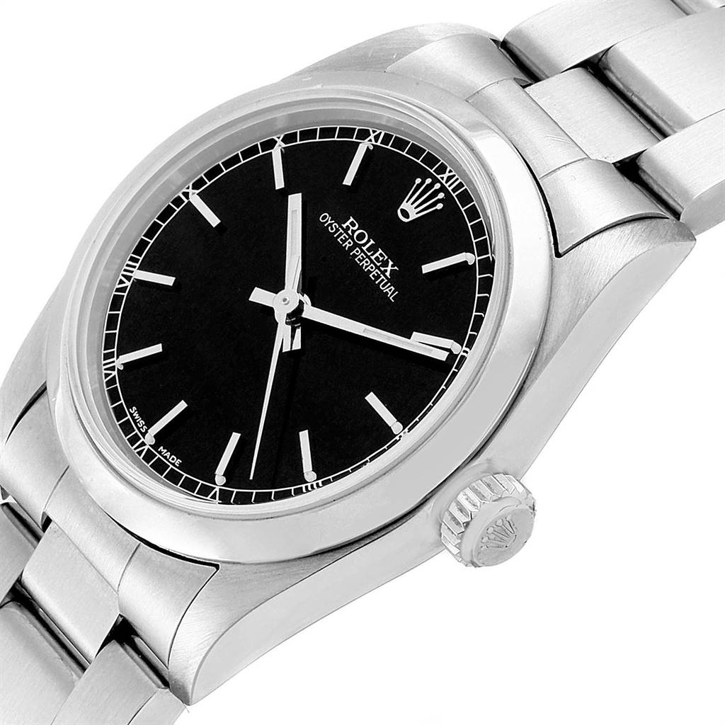 The image shows a close-up angled view of the Rolex Mid-Size 77080 Women's Stainless Steel Black Dial 77080 Women's Stainless Steel Black Dial Oyster Perpetual watch, highlighting the dial, case, and bracelet.