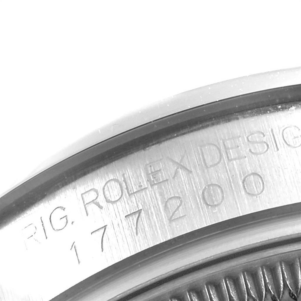 The image shows a close-up view of the engraved case back edge of a Rolex Mid-Size 177200 Women's Stainless Steel Blue Dial 177200 Women's Stainless Steel Blue Dial model watch.