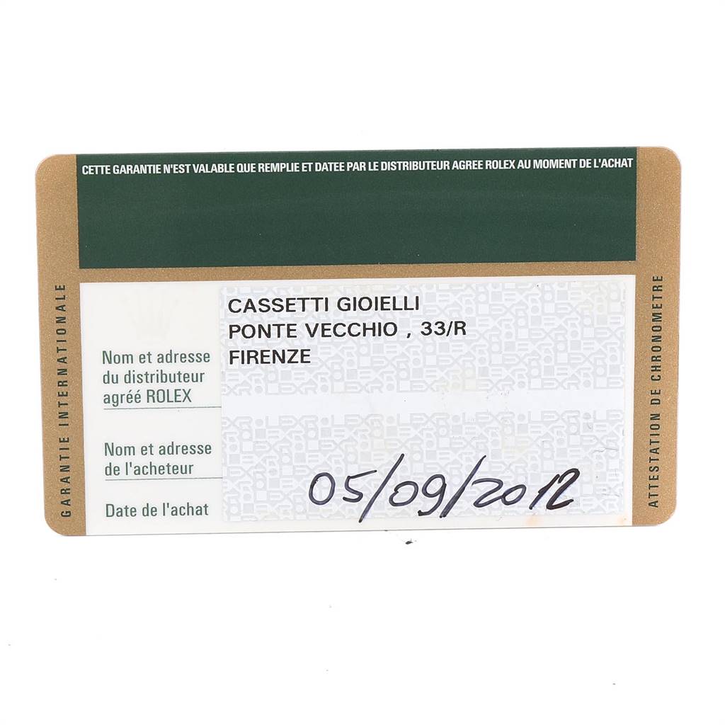 This image shows a warranty card for a Mid-Size Rolex watch, including the distributor and purchase date.