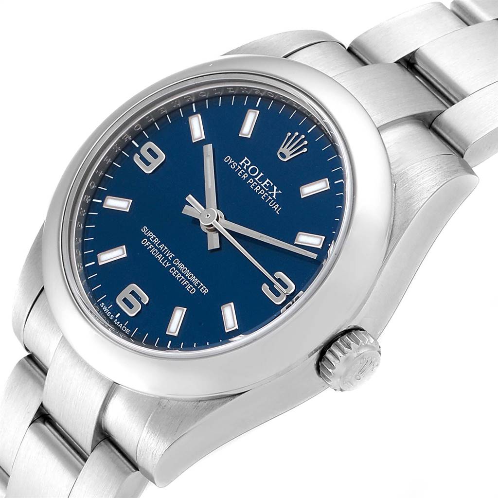 This image shows a Rolex Oyster Perpetual Mid-Size watch from an angled side view, highlighting the dial, case, and bracelet.