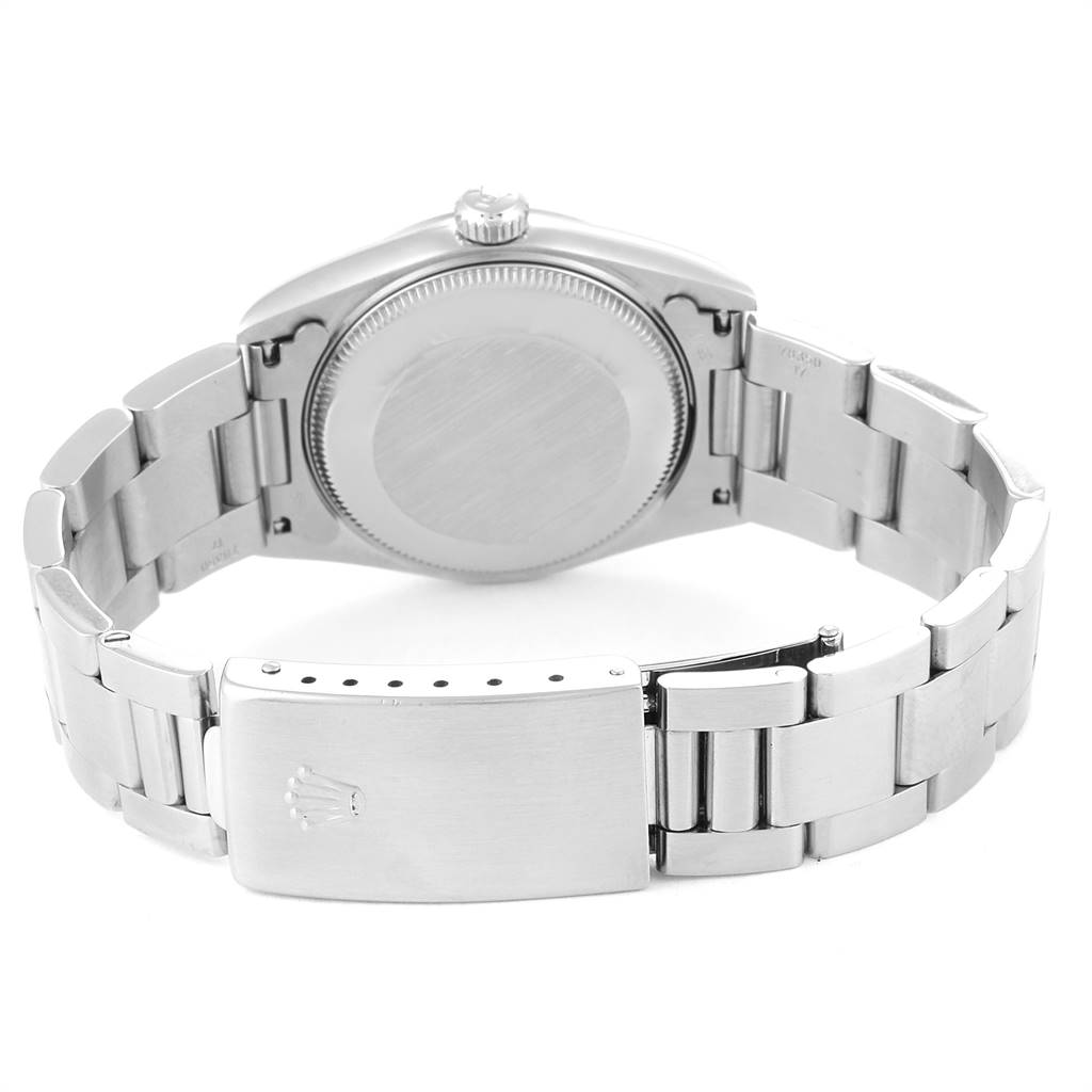 This image shows the back and bracelet of the Rolex Mid-Size 77080 Women
s Stainless Steel Black Dial 77080 Women
s Stainless Steel Black Dial model watch, featuring the clasp and case back.