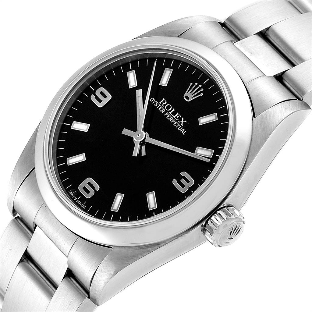 This image shows a Rolex Mid-Size 77080 Women's Stainless Steel Black Dial 77080 Women's Stainless Steel Black Dial model watch in a close-up angle, highlighting the black dial, silver markers, crown, and metal bracelet.