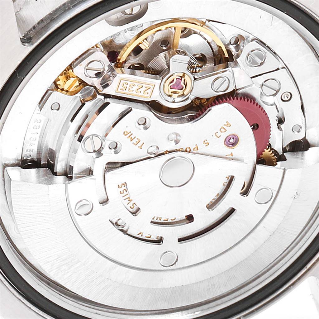 This image shows a detailed view of the inner mechanical movement of a Rolex Mid-Size 178243 Women's Stainless Steel Grey Dial 178243 Women's Stainless Steel Grey Dial watch, including gears and components.