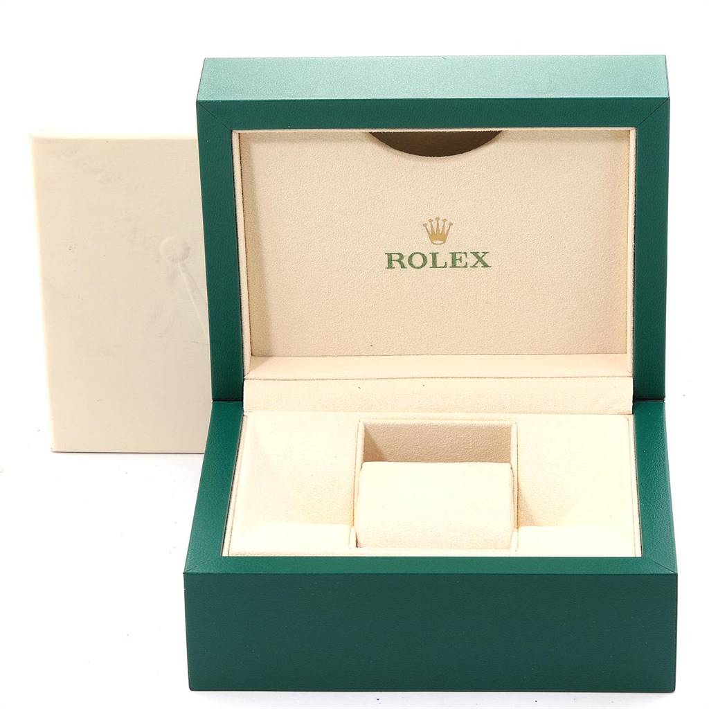 This image shows the open green and cream box for a Rolex Mid-Size 178243 Women's Stainless Steel Grey Dial 178243 Women's Stainless Steel Grey Dial model watch.