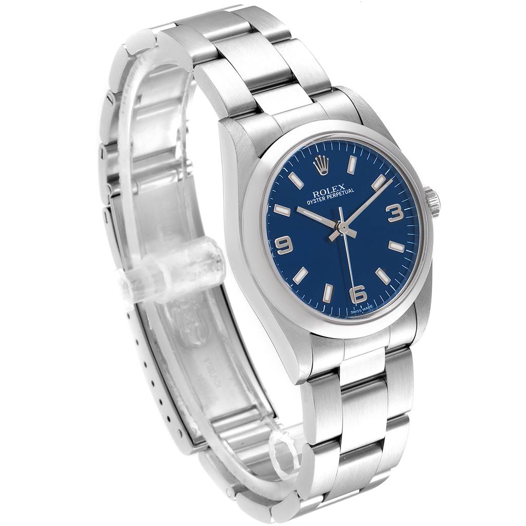 The image shows a Rolex Oyster Perpetual Mid-Size model, captured from a three-quarter angle displaying the watch face and bracelet.