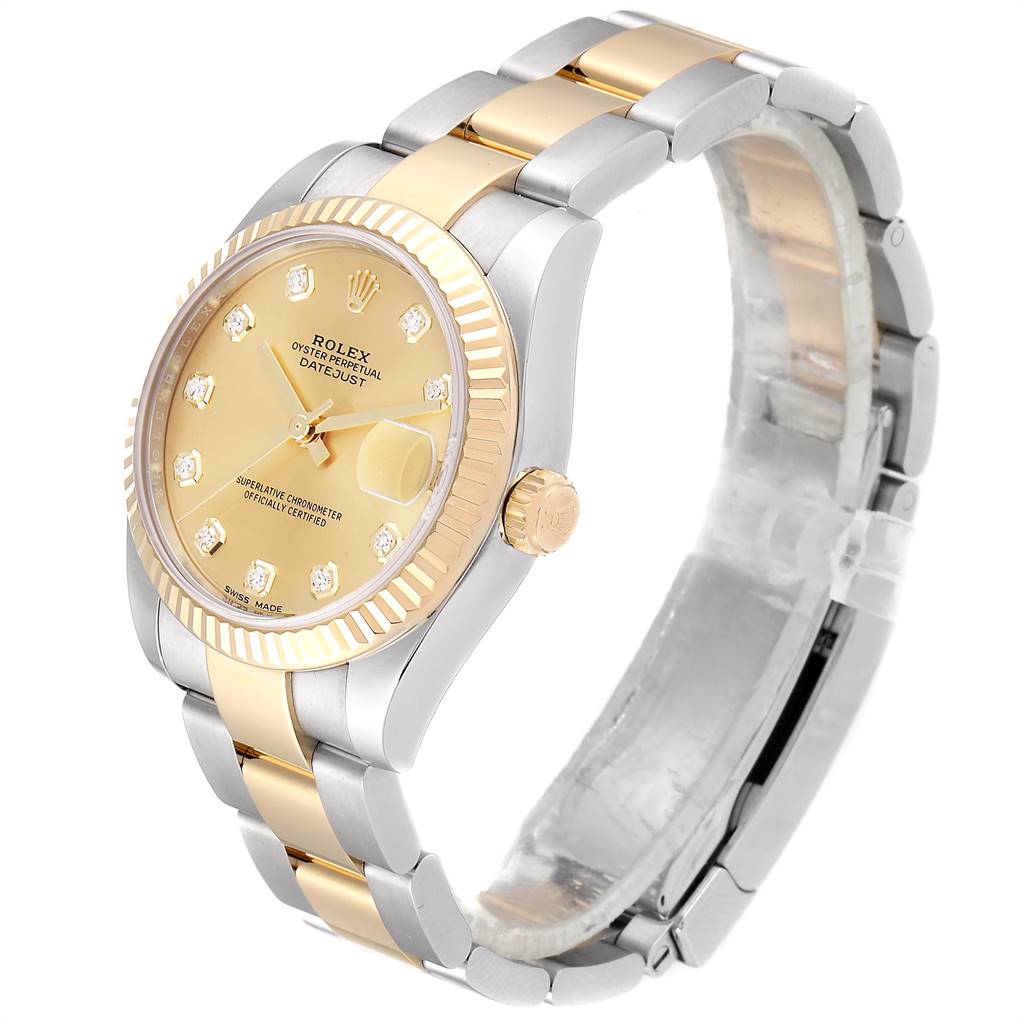 The image shows a mid-size Rolex Datejust watch at a slight angle, highlighting its gold and silver bracelet, crown, and face.