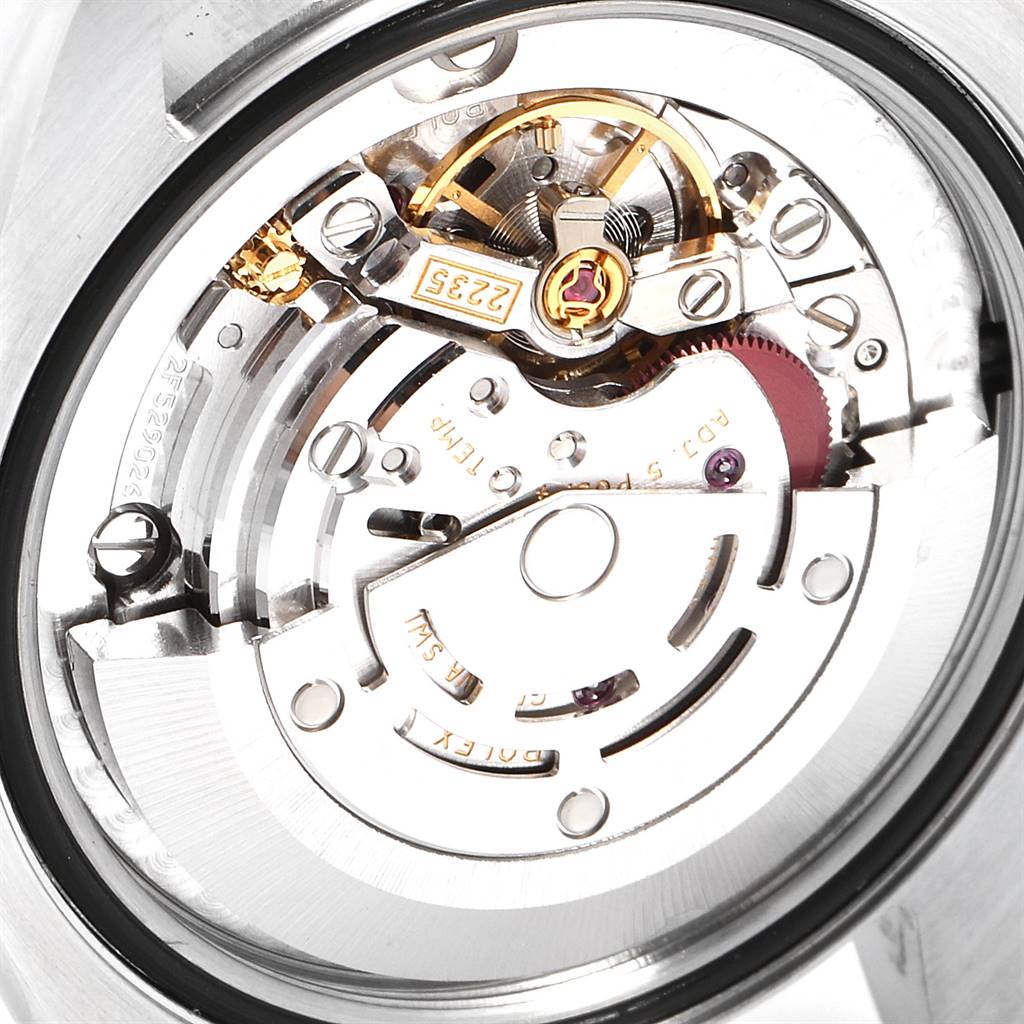 This image shows the back view of the Rolex Mid-Size 178384 Women
s Stainless Steel Mother of Pearl Dial 178384 Women
s Stainless Steel Mother of Pearl Dial watch, highlighting its internal mechanical movement components.