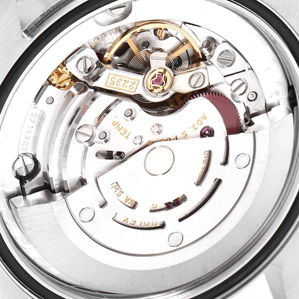 This is an image of the inner mechanism of a Rolex Mid-Size 178274 Women's Stainless Steel White Dial 178274 Women's Stainless Steel White Dial model watch, showcasing the intricate gears and movements.