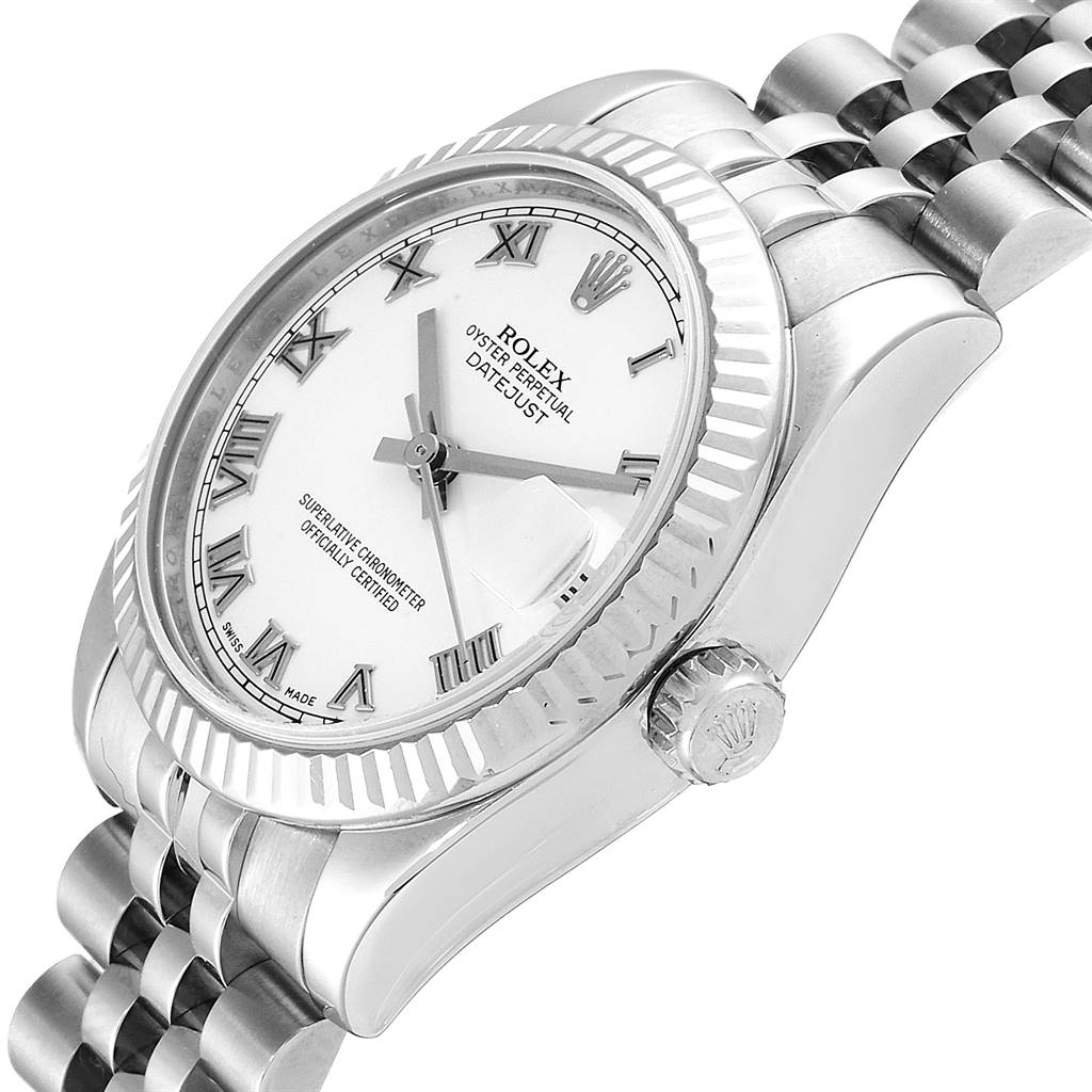 The image shows a tilted side view of a Rolex Mid-Size 178274 Women's Stainless Steel White Dial 178274 Women's Stainless Steel White Dial Datejust watch, highlighting the dial, bezel, and part of the bracelet.