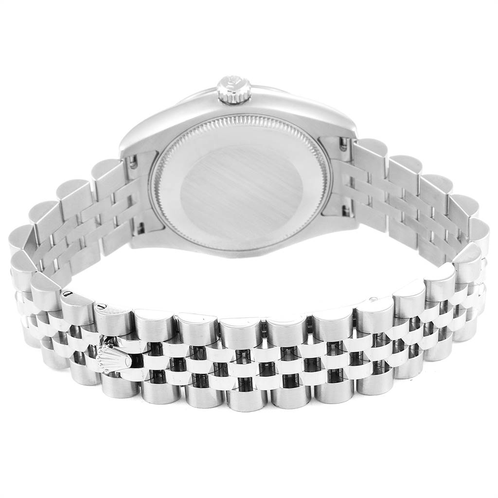 The image shows the back view of a Mid-Size Rolex watch, focusing on the case back and metal bracelet.