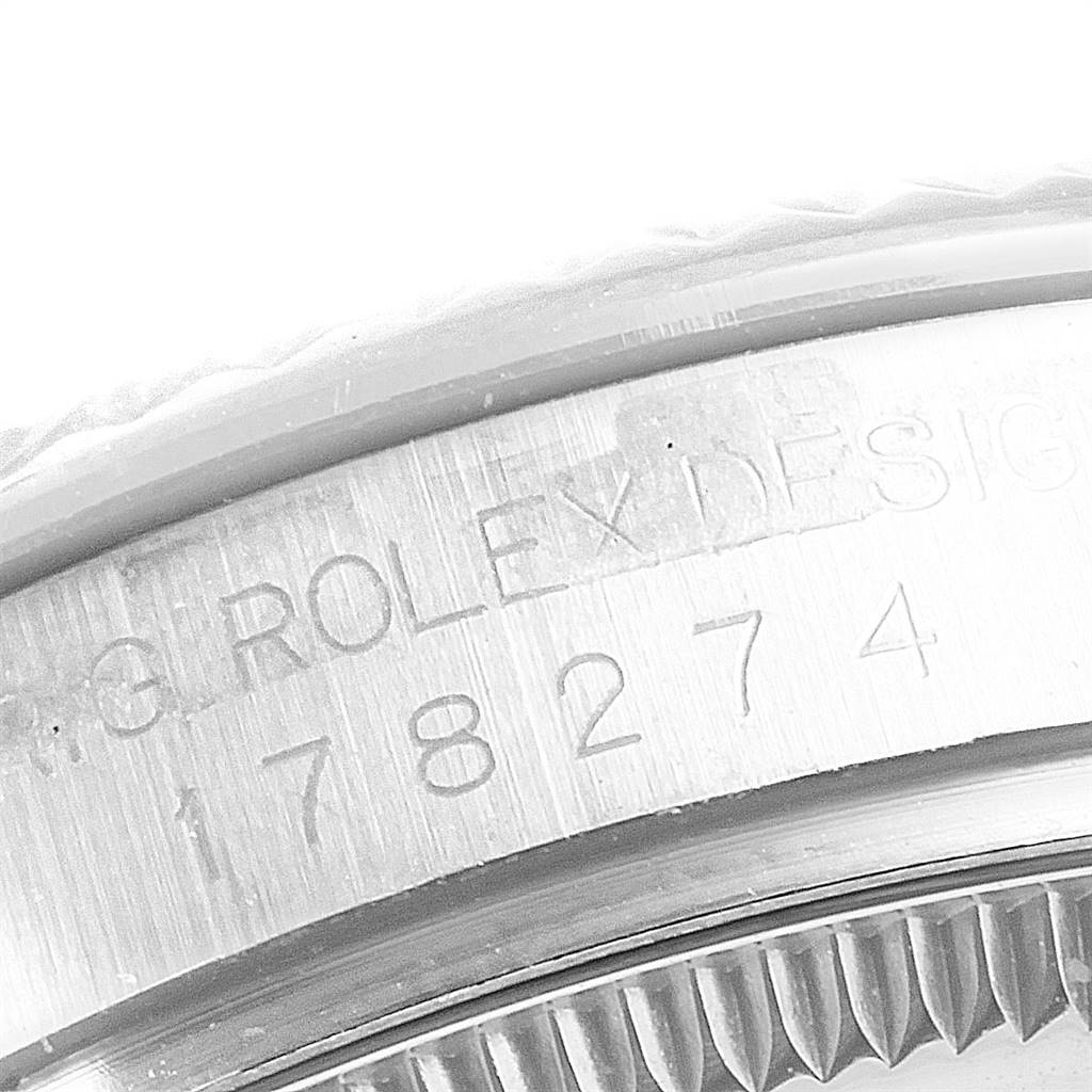 The image shows a close-up of the side engraving on the case of a Rolex Mid-Size 178274 Women's Stainless Steel White Dial 178274 Women's Stainless Steel White Dial model watch, displaying its reference number (178274).