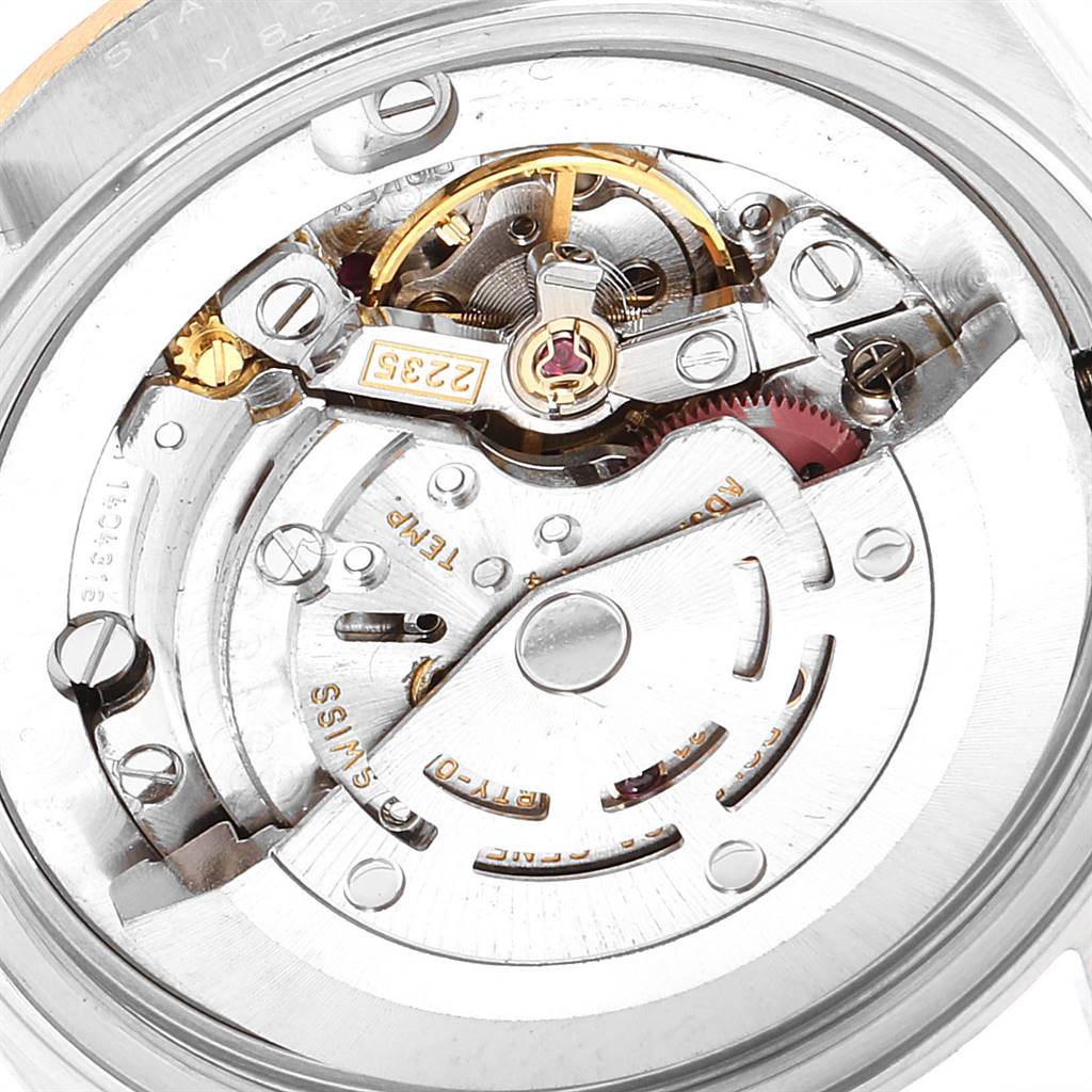 This image shows the internal mechanism and movement of the Rolex Mid-Size 78273 Women's Steel and Gold (two tone) Silver Dial 78273 Women's Steel and Gold (two tone) Silver Dial watch from the back.