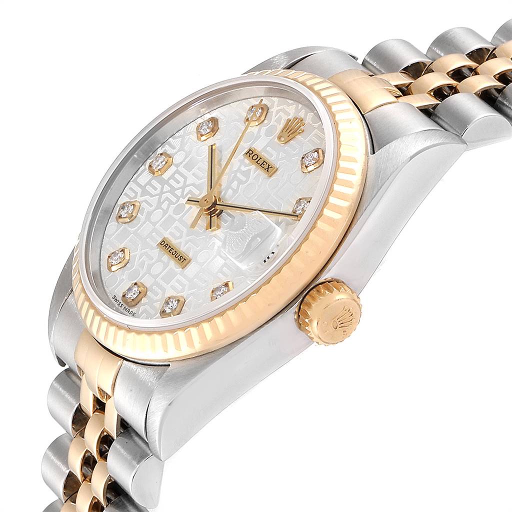 This image shows a Rolex Mid-Size 78273 Women's Steel and Gold (two tone) Silver Dial 78273 Women's Steel and Gold (two tone) Silver Dial model watch at an angle focusing on the dial, bezel, crown, and part of the bracelet.