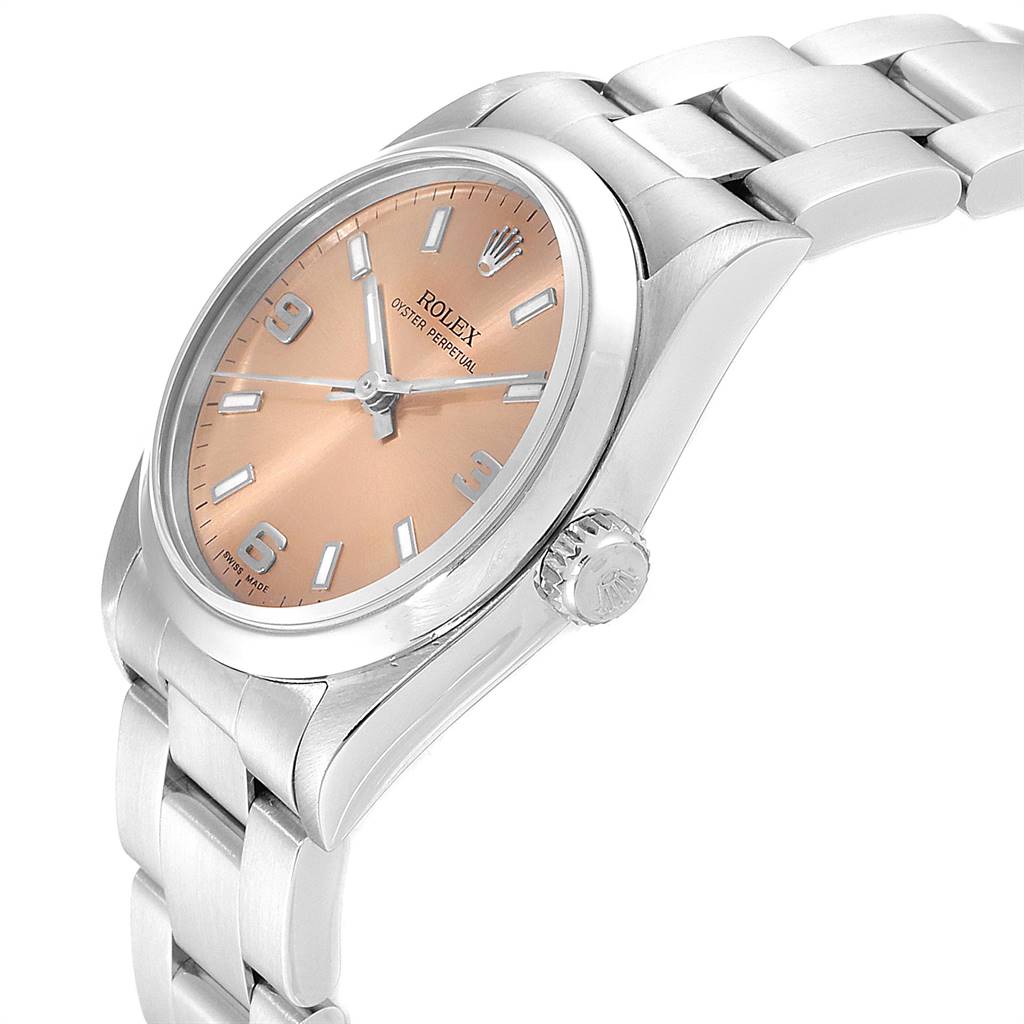 This image shows a Rolex Oyster Perpetual Mid-Size watch at a slight angle, highlighting the crown, dial, and bracelet.