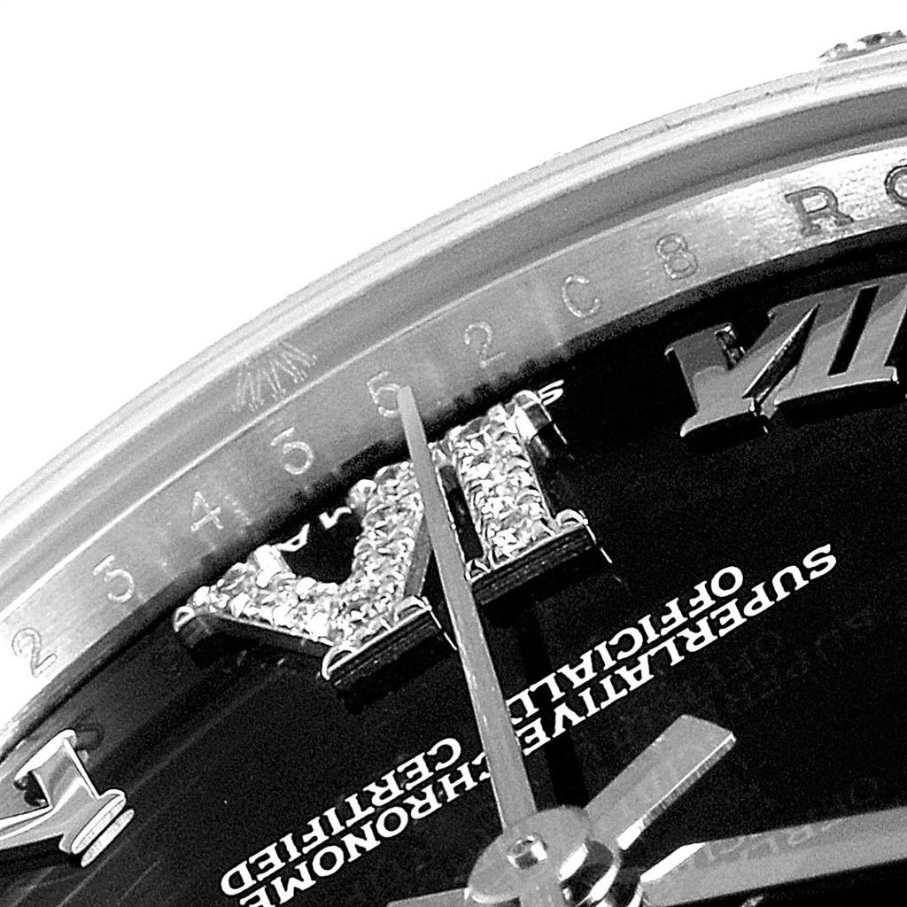 The image shows a close-up angle of the dial and hands of a Rolex Mid-Size 178344 Women's Stainless Steel Blue Dial 178344 Women's Stainless Steel Blue Dial model watch, featuring part of the bezel and Roman numerals.