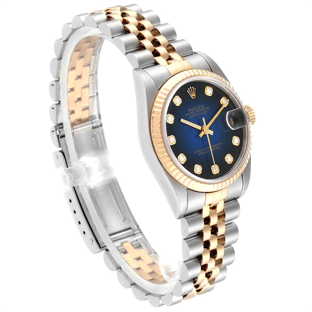 The Rolex Mid-Size 68273 Women's Steel and Gold (two tone) Blue Dial 68273 Women's Steel and Gold (two tone) Blue Dial model watch is shown at a three-quarters angle displaying the face, bezel, and bi-color bracelet.