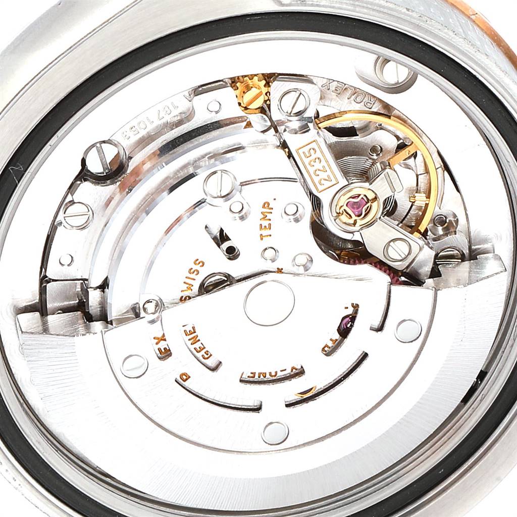 This image is a close-up view of the internal mechanism of a Rolex Mid-Size 178271 Women's Steel and Gold (two tone) Black Dial 178271 Women's Steel and Gold (two tone) Black Dial model watch.