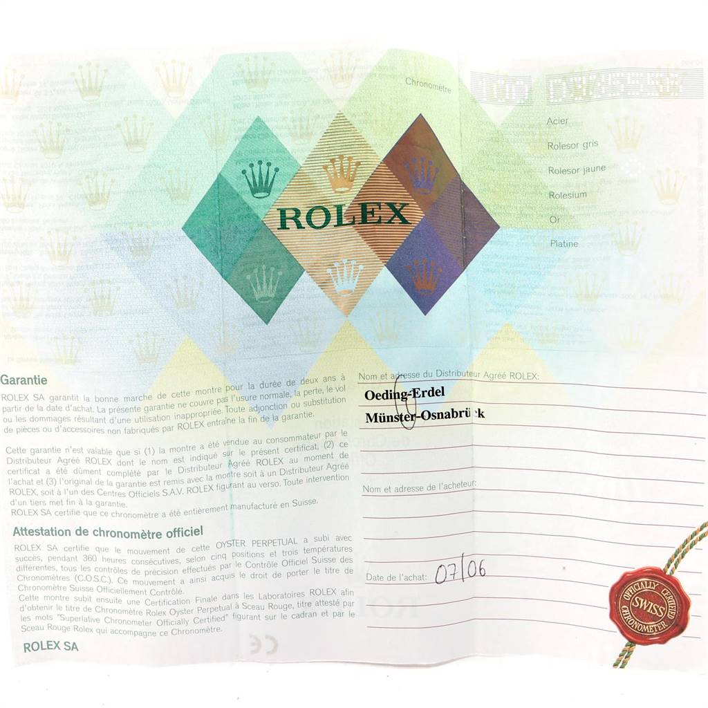 This image shows the warranty certificate for a Rolex Mid-Size 178271 Women's Steel and Gold (two tone) Black Dial 178271 Women's Steel and Gold (two tone) Black Dial model watch, featuring the Rolex logo and official information.