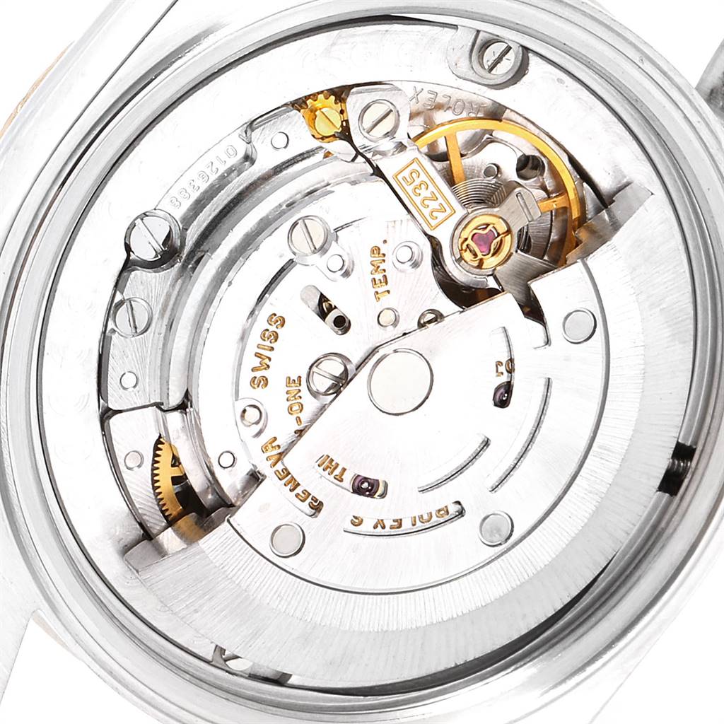 This image shows the intricate inner movement mechanism of a Rolex Mid-Size 78273 Women's Steel and Gold (two tone) Blue Dial 78273 Women's Steel and Gold (two tone) Blue Dial model watch.