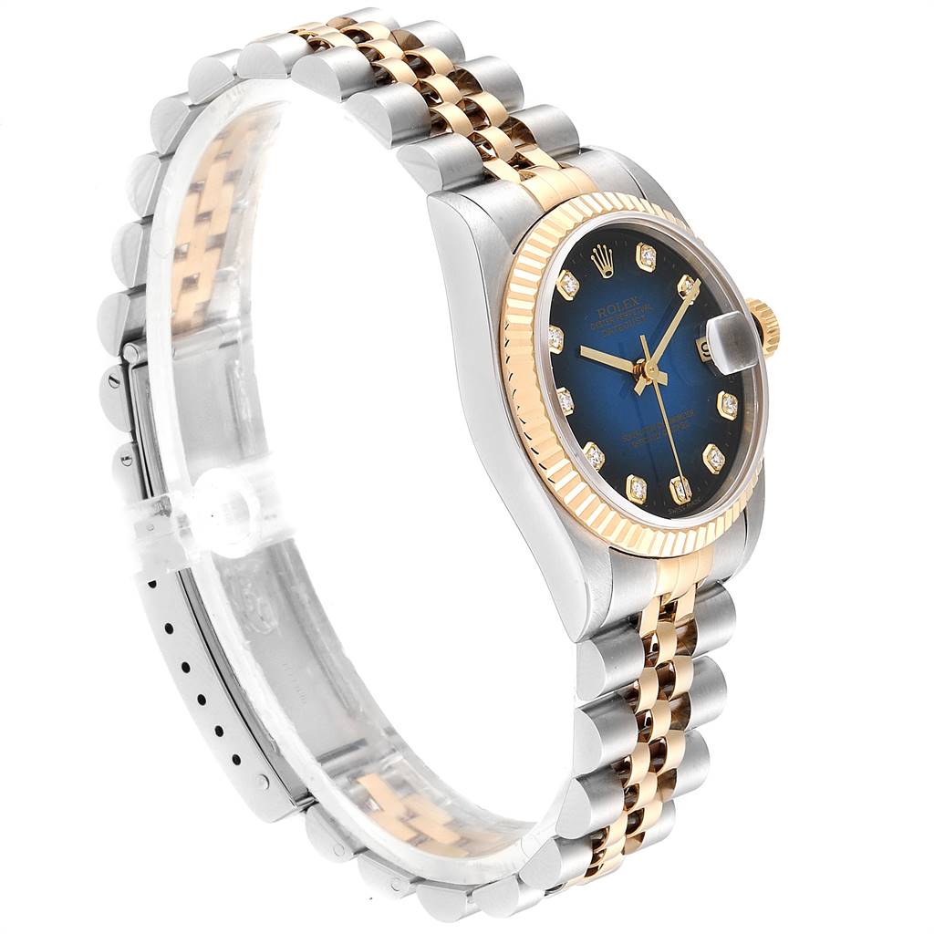 This image shows a side angle of a mid-size Rolex watch, highlighting the band, bezel, and dial.
