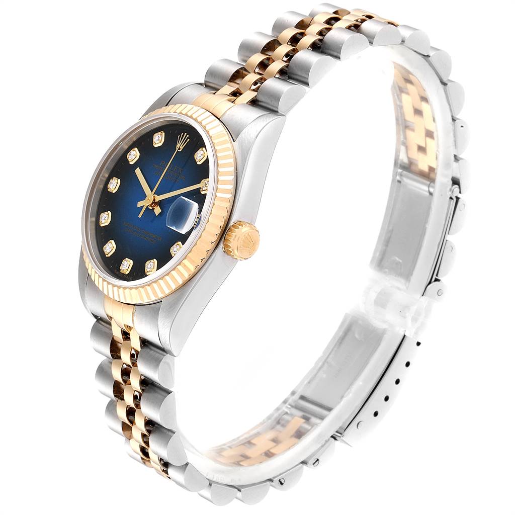 This Rolex Mid-Size 78273 Women's Steel and Gold (two tone) Blue Dial 78273 Women's Steel and Gold (two tone) Blue Dial model watch is shown at a slight angle, displaying the face, crown, and two-tone bracelet.