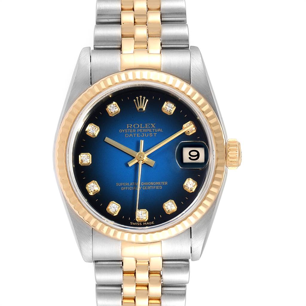 The image displays a front view of the Rolex Mid-Size 78273 Women's Steel and Gold (two tone) Blue Dial 78273 Women's Steel and Gold (two tone) Blue Dial Datejust watch, showcasing its blue dial, gold bezel, and two-tone bracelet.