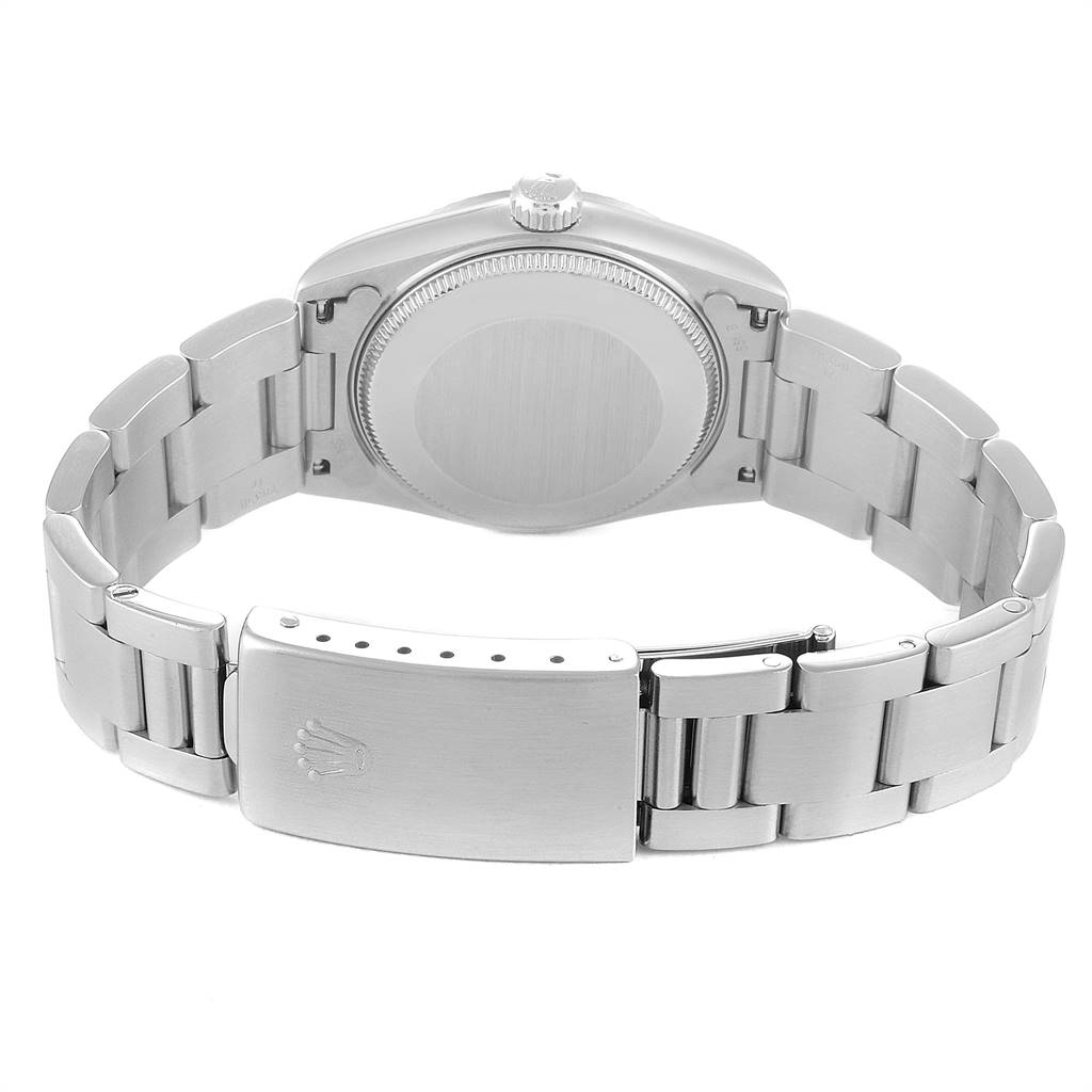 The image shows the back view of a Mid-Size Rolex watch, including the case, crown, bracelet, and clasp.