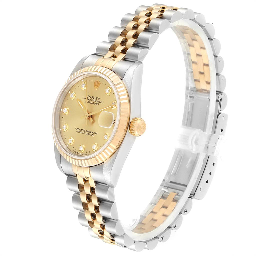 The image shows a Rolex Mid-Size 68273 Women's Steel and Gold (two tone) Champagne Dial 68273 Women's Steel and Gold (two tone) Champagne Dial model watch from an angled top view, displaying its gold and stainless steel bracelet and dial.