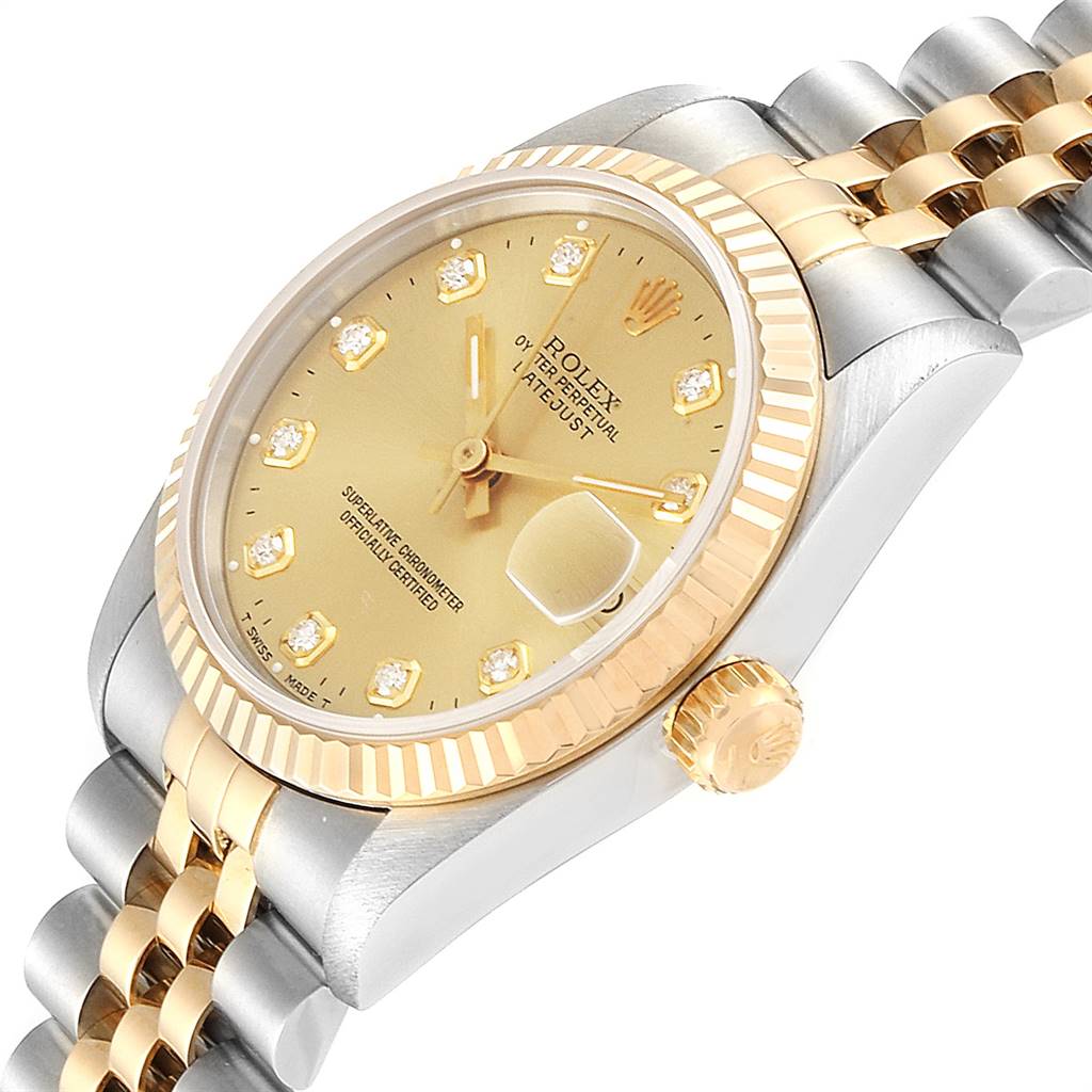 This image shows a side view of a Rolex Mid-Size 68273 Women's Steel and Gold (two tone) Champagne Dial 68273 Women's Steel and Gold (two tone) Champagne Dial model watch, highlighting its bezel, dial, bracelet, and crown.