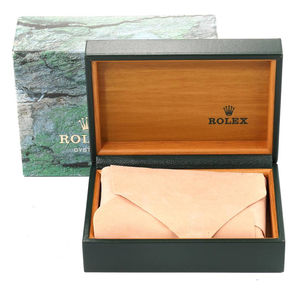 The image shows an open Rolex watch box for the Mid-Size model, with a green outer box and a wooden interior.