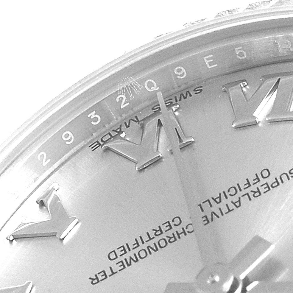 This close-up angle of the Rolex Mid-Size 178274 Women's Stainless Steel Silver Dial 178274 Women's Stainless Steel Silver Dial watch shows the Roman numeral VI, part of the dial, and the "Swiss Made" marking.