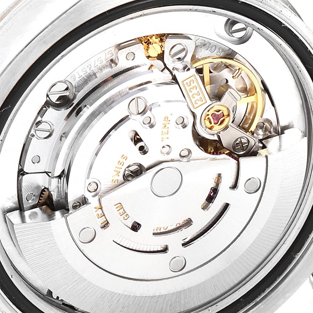 The image shows the movement and internal components of a Rolex Mid-Size 178274 Women's Stainless Steel Silver Dial 178274 Women's Stainless Steel Silver Dial watch.
