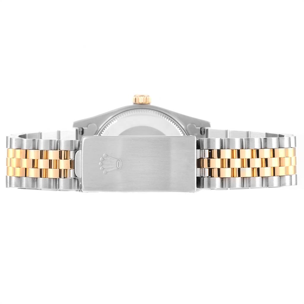 This image shows the bracelet and clasp of a Rolex Mid-Size 178273 Women's Steel and Gold (two tone) Silver Dial 178273 Women's Steel and Gold (two tone) Silver Dial model watch, viewed from the back.