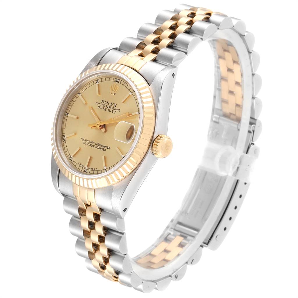 The Rolex Mid-Size 68273 Women's Steel and Gold (two tone) Champagne Dial 68273 Women's Steel and Gold (two tone) Champagne Dial model watch is shown at an angled view, highlighting its two-tone bracelet, bezel, dial, and crown.