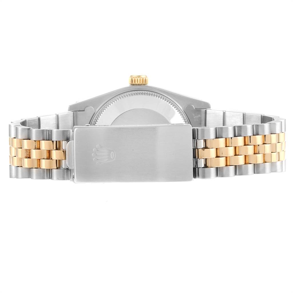 This image shows the clasp and bracelet at the back of a Mid-Size Rolex watch.