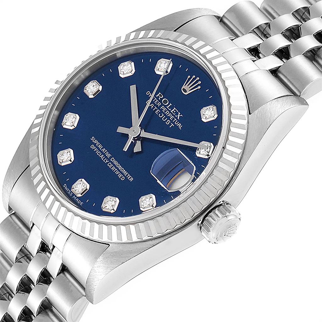 This angle showcases the dial, bezel, crown, and part of the bracelet of the Rolex Mid-Size 68274 Women's Stainless Steel Blue Dial 68274 Women's Stainless Steel Blue Dial model watch.